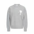 Amiri knit sweater in light gray with crew neck and white heart A logo