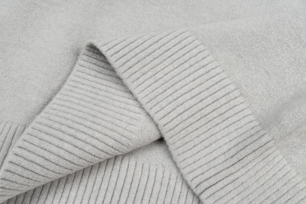 Amiri knit sweater knit close-up with ribbed cuffs and textured fabric