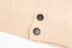 Amiri light peach cardigan hem with two black buttons and ribbed trim