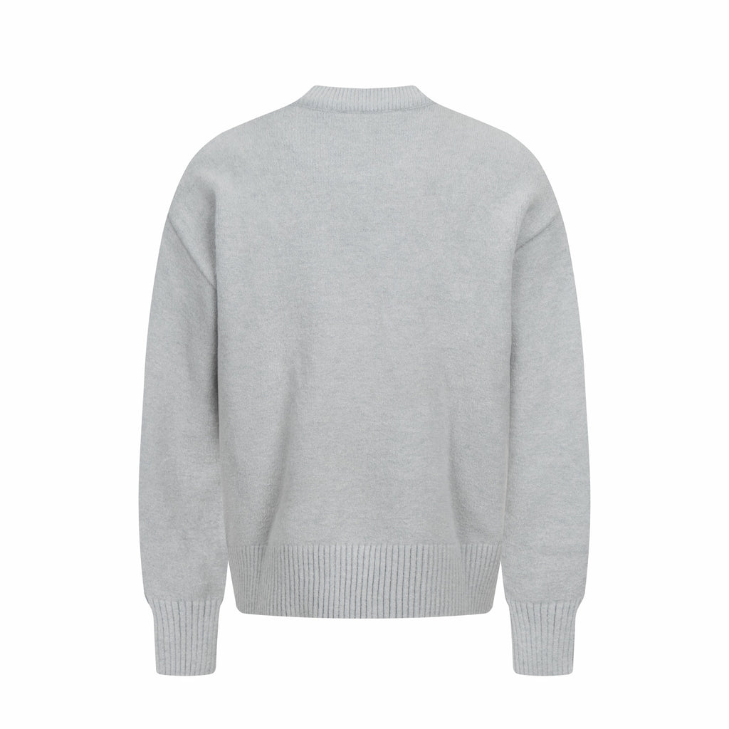 Amiri knit sweater in light gray with crew neck, ribbed cuffs, and hem