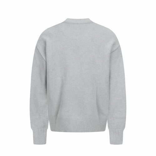 Amiri knit sweater in light gray with crew neck, ribbed cuffs, and hem