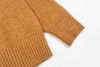 Tan cardigan sleeves with ribbed cuffs and knit hem