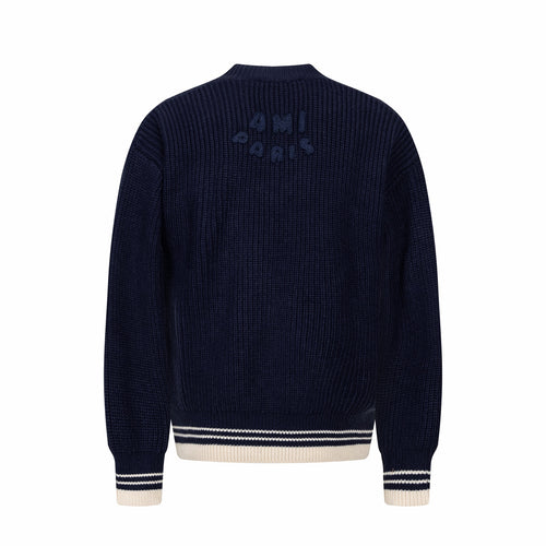 Navy knit sweater back view with ribbed hem and cuffs