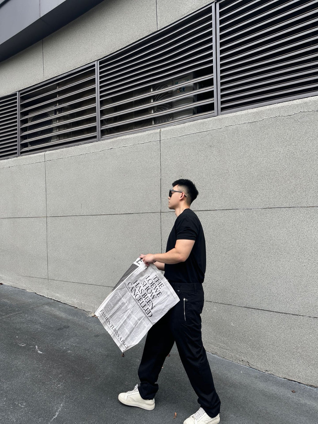 Black tapered pants with side pocket and Fendi-logo patch on the hip