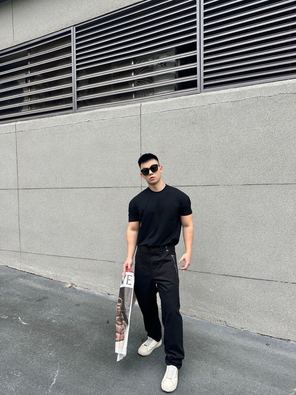Black Fendi-logo patch pants with tapered fit, belt loops, and relaxed thigh