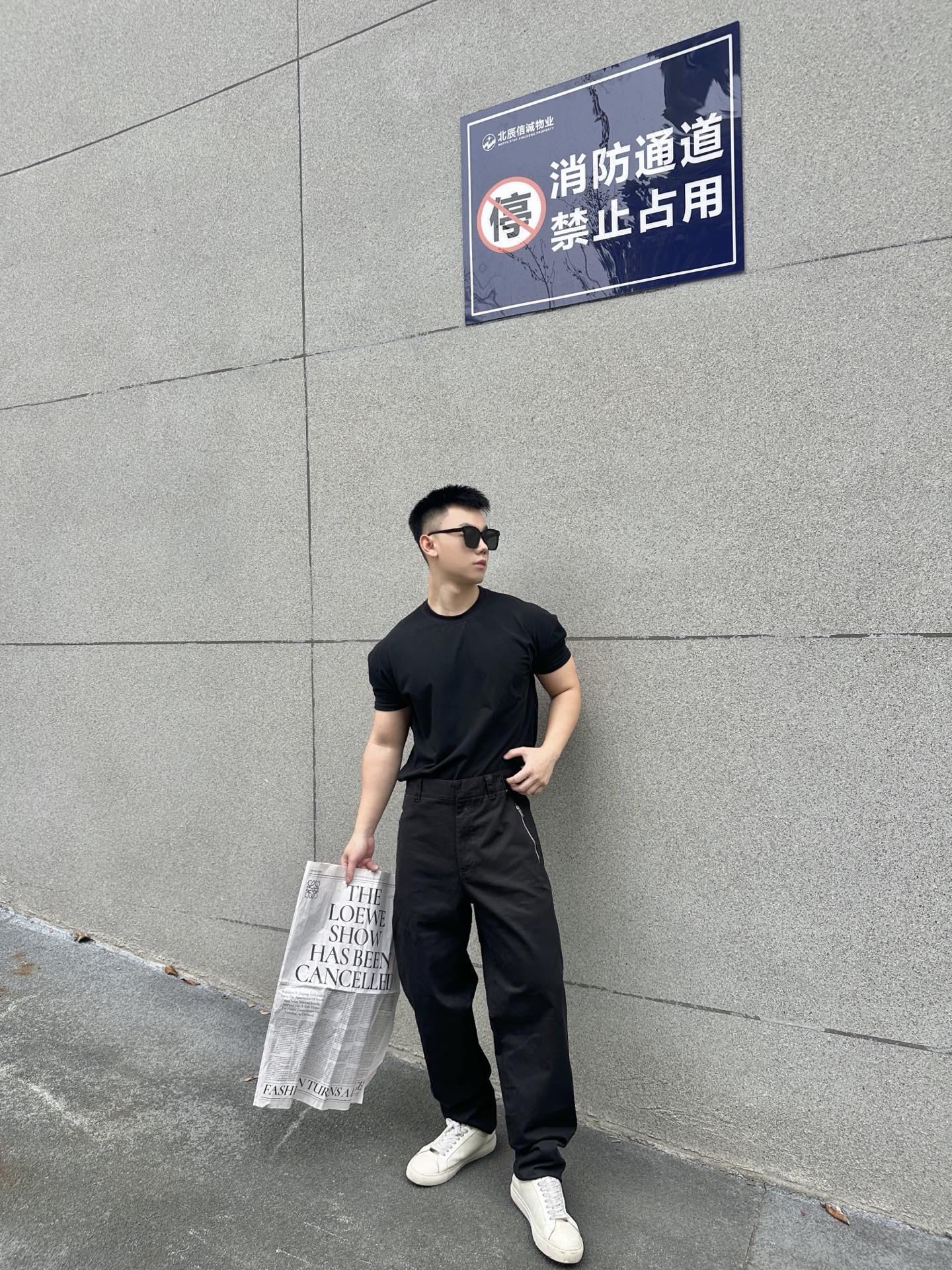 Black Fendi-logo patch pants with straight-tapered legs and front fly opening