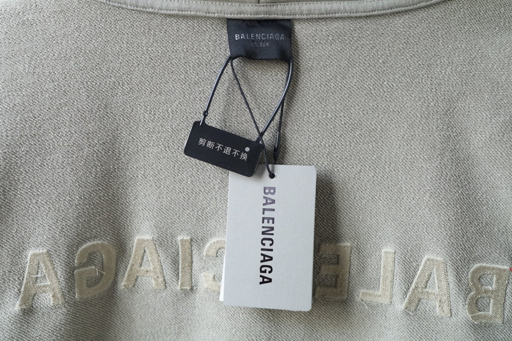 Hoodie interior neck label with Balenciaga hang tags