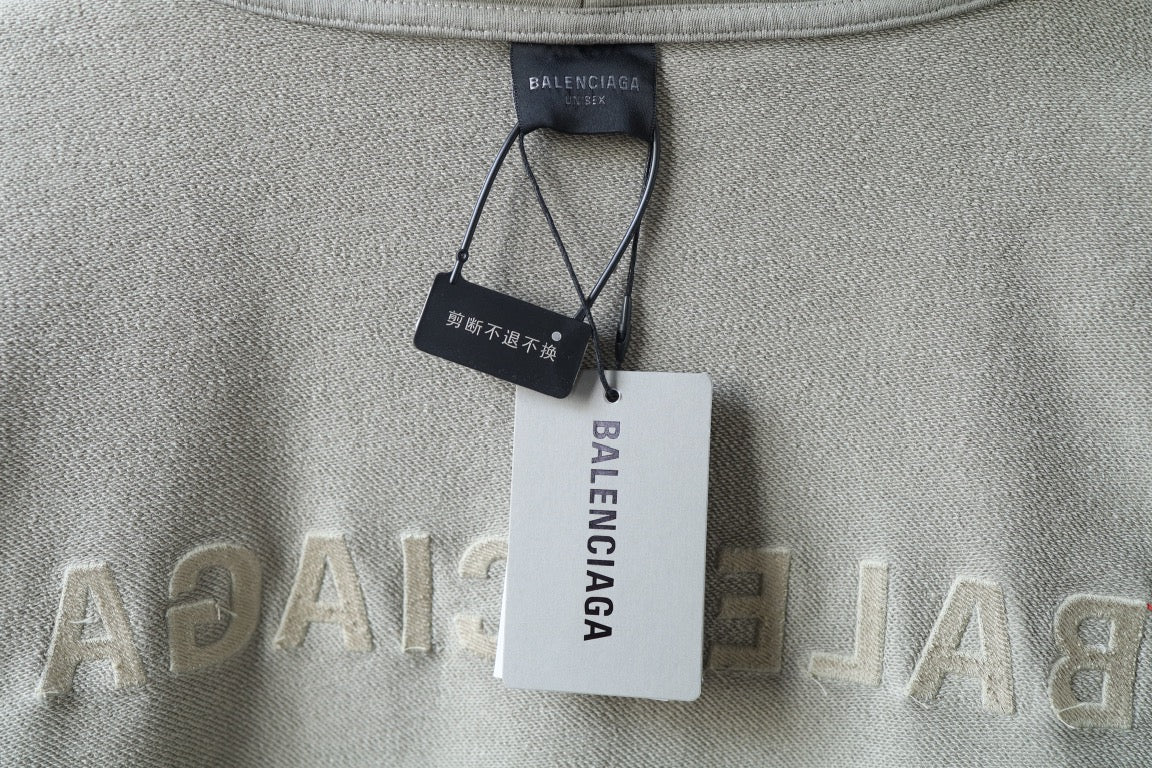 Hoodie interior neck label with Balenciaga hang tags
