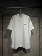 White Balenciaga short-sleeve T-shirt on hanger with small chest logo print