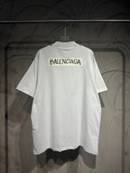 White Balenciaga T-shirt front view with chest logo and straight hem