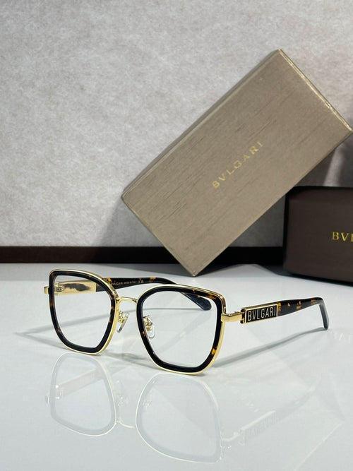 Bvlgari eyeglasses with dark frame and gold-toned temples, clear lenses, front view