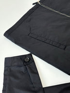 Prada black pants-style jacket bottom with button closure and zipper hem