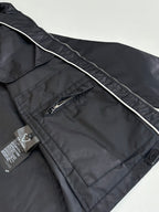 Long jacket with diagonal zip pocket and piping detail, dark