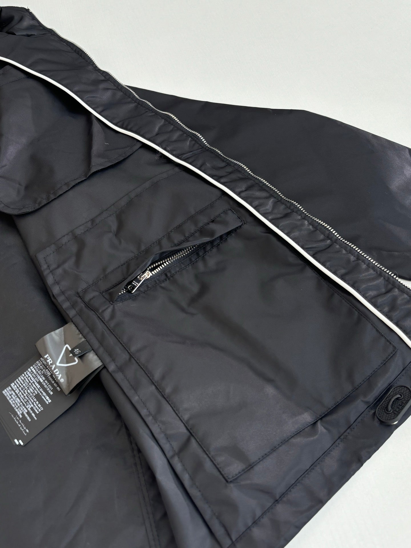 Long jacket with diagonal zip pocket and piping detail, dark