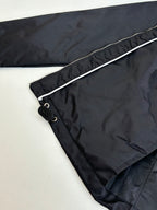 Prada black jacket interior hem detail with drawstring and buttoned pocket