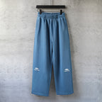 Balenciaga wide-leg pants in light blue with elastic waistband and cuffed hem