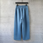 Balenciaga wide-leg pants in light blue, front view with elastic waistband