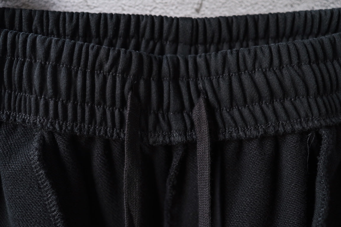Balenciaga black pants with gathered elastic waistband texture