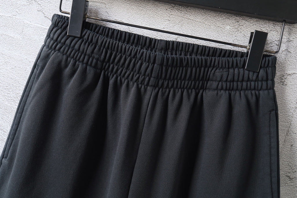Balenciaga black pants with ribbed elastic waistband and pleated front