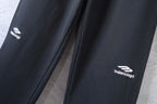 Balenciaga black pants with embroidered balenciaga logo on side