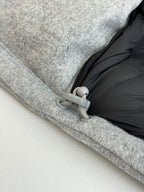 Light gray Louis Vuitton monogram jacket with zipper and drawstring tag detail