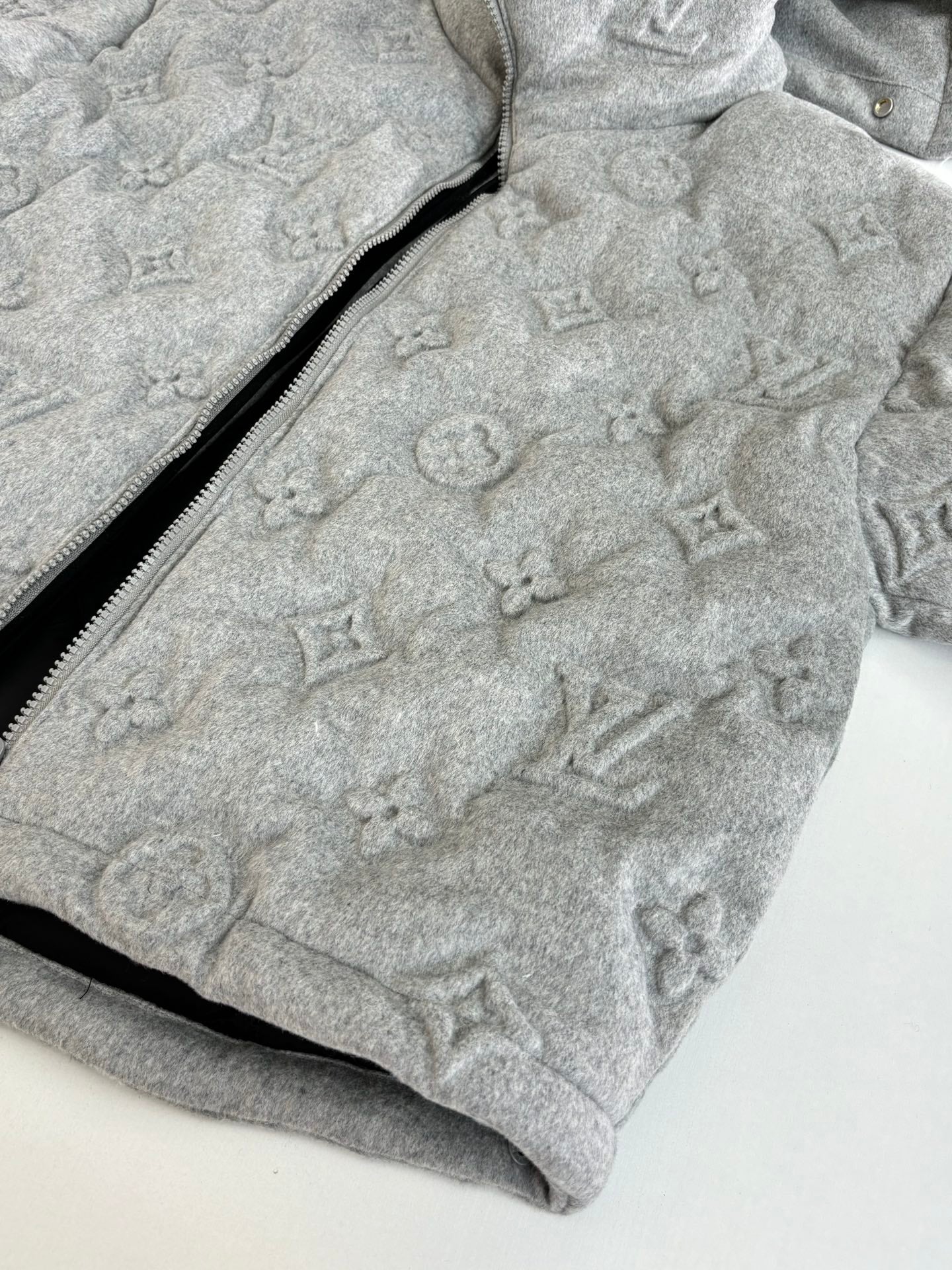 Light gray Louis Vuitton monogram zip-up hooded jacket, front close-up
