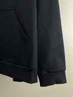 Dark Balenciaga hoodie hem with ribbed cuff and stitched seam detail