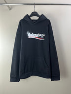 Dark Balenciaga long-sleeve hoodie with front logo graphic and kangaroo pocket