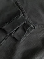 Dark navy hoodie fabric with seam stitching and folded collar detail
