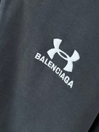 Balenciaga logo patch on dark navy zip hoodie fabric
