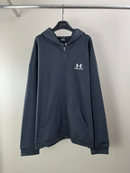 Balenciaga dark navy zip hoodie with hood, front pocket, and chest logo