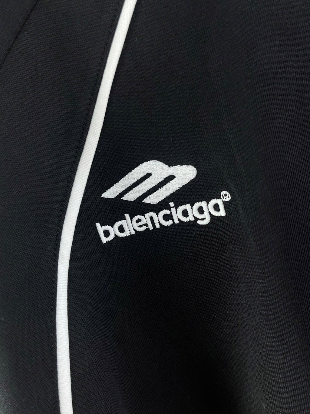 balenciaga logo on black jersey with white side stripe