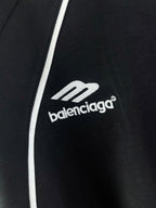 balenciaga logo on black jersey with white side stripe