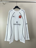 White long-sleeve jersey with Balenciaga logos and crest patch on chest