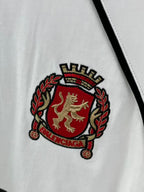 White jersey with embroidered Balenciaga crest patch in red and gold