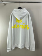 White long-sleeve hoodie with hood and yellow back graphic text and symbol
