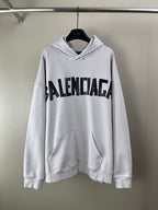 White long-sleeve hoodie with hood and large BALENCIAGA logo print