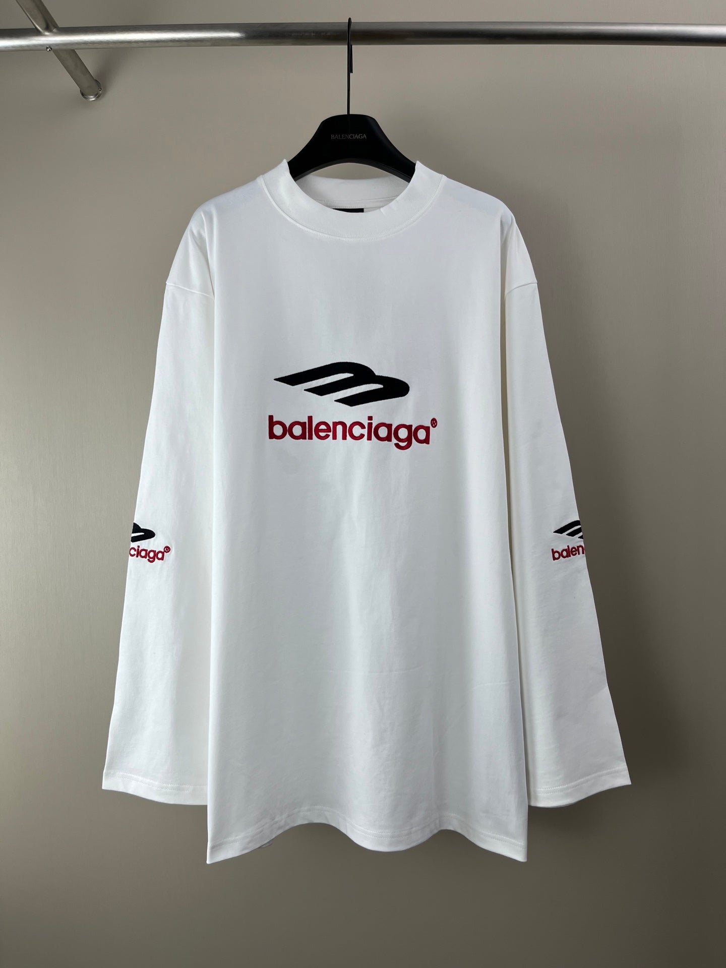 White long-sleeve T-shirt with Balenciaga logo print at chest