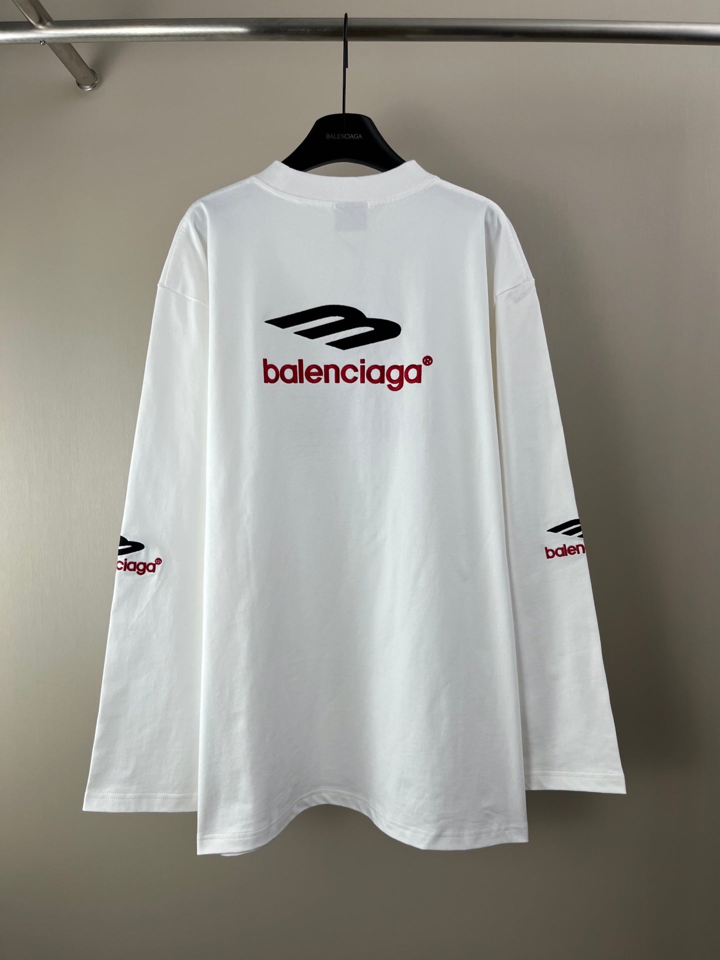 White long-sleeve T-shirt with Balenciaga logo print on back