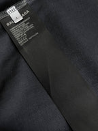 Navy T-shirt with black inner neck label and fabric seam detail