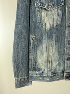 Washed blue denim jacket lower front with vertical flap pocket