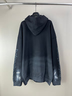 Long hooded sweatshirt with large metallic logo and signature print on both sleeves