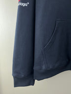 Navy long-sleeve hoodie with kangaroo pocket and ribbed cuffs