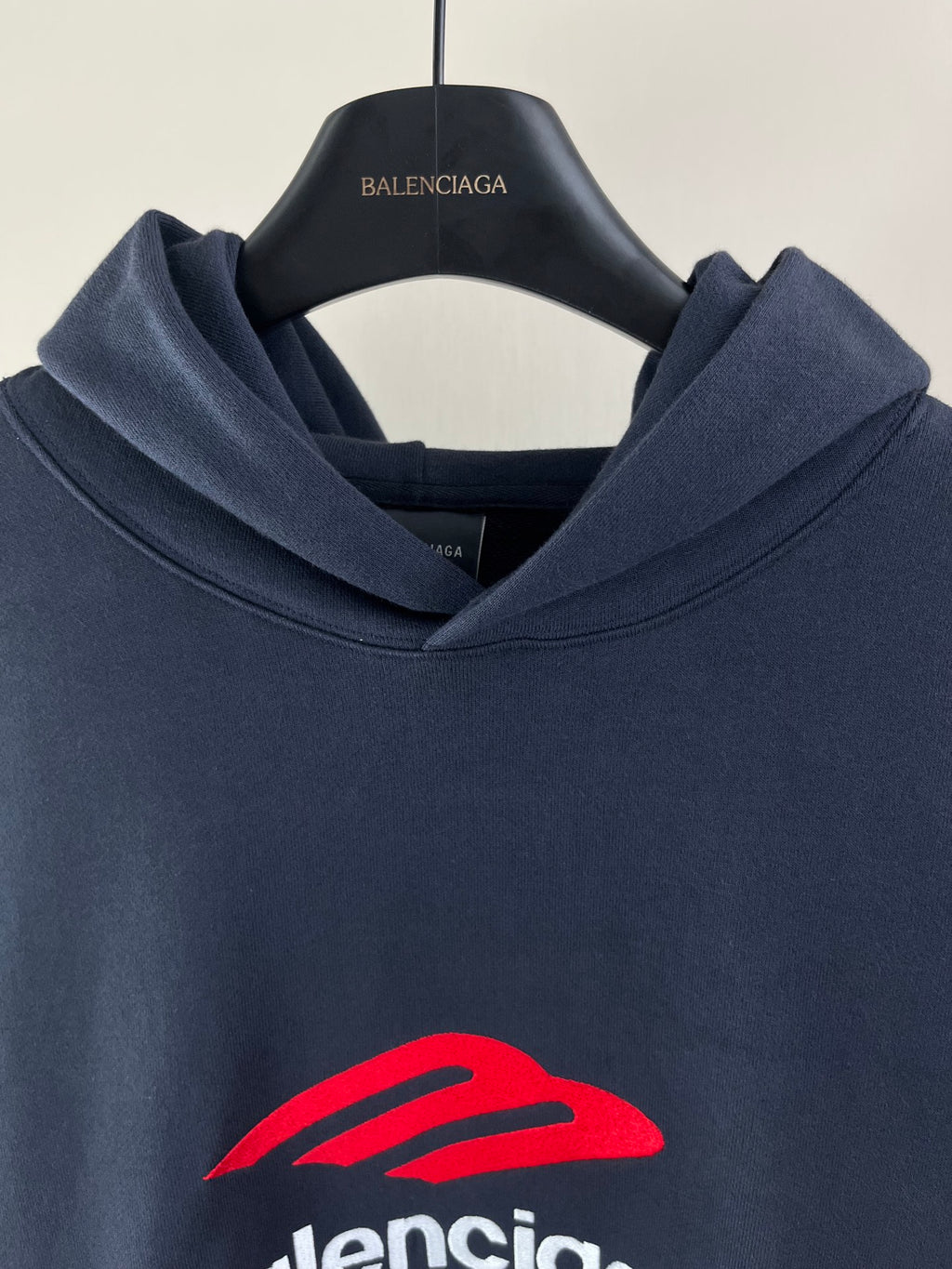 Navy long-sleeve hoodie hood with embroidered Balenciaga logo