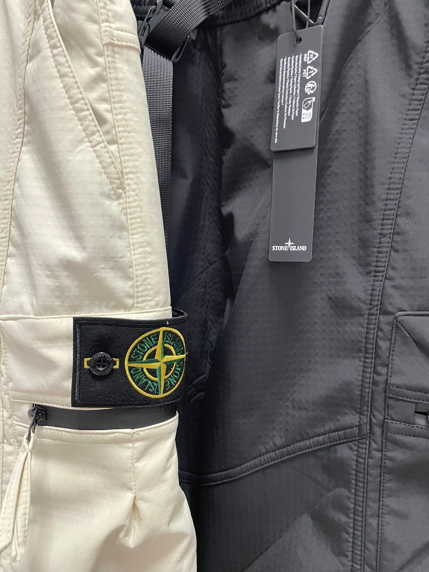 Stone Island off-white pants with logo patch and inner label