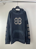 Balenciaga long-sleeve hoodie in dark blue with hood, kangaroo pocket, and large BB logo
