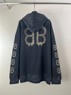 Balenciaga long-sleeve hoodie back view in dark blue with hood, large BB logo, sleeve logos