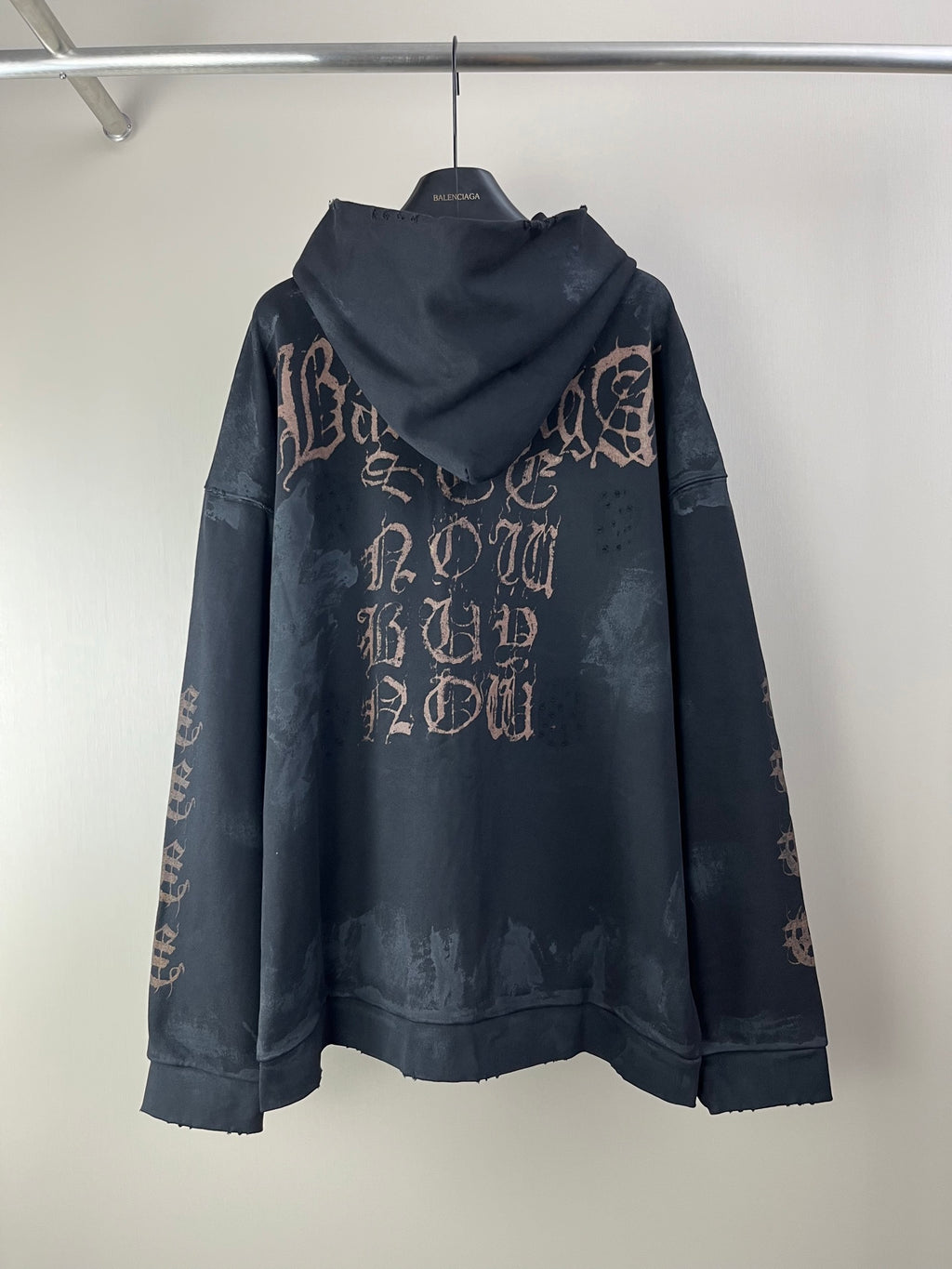 Balenciaga long-sleeve zip hoodie, hooded back view with large logo-style print