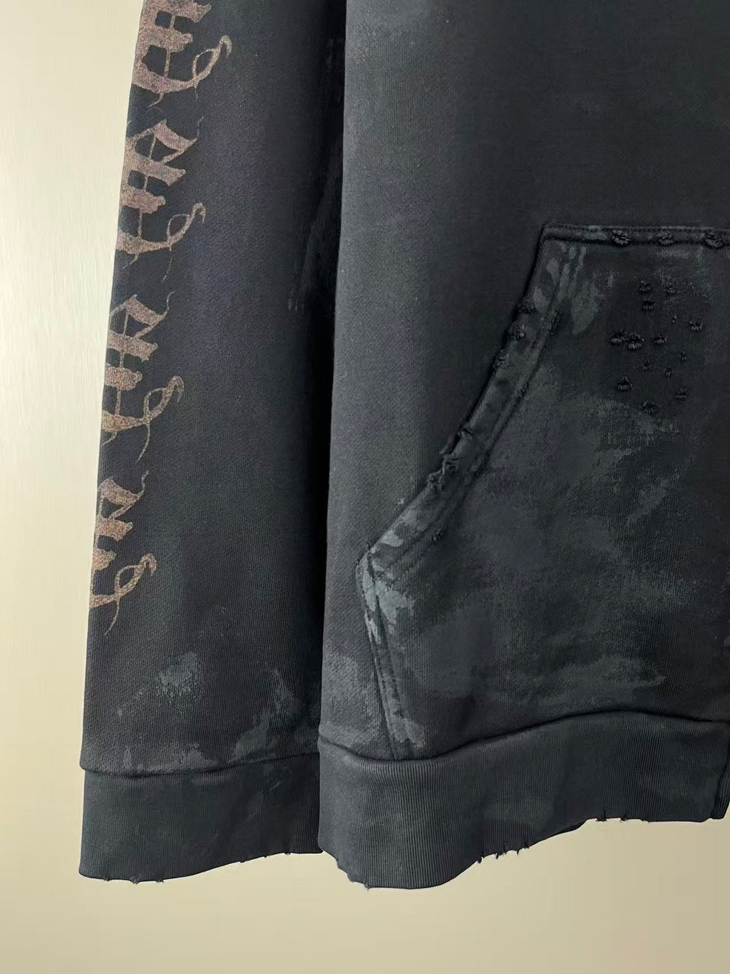 Balenciaga long-sleeve zip hoodie side view with front pocket and sleeve logo print
