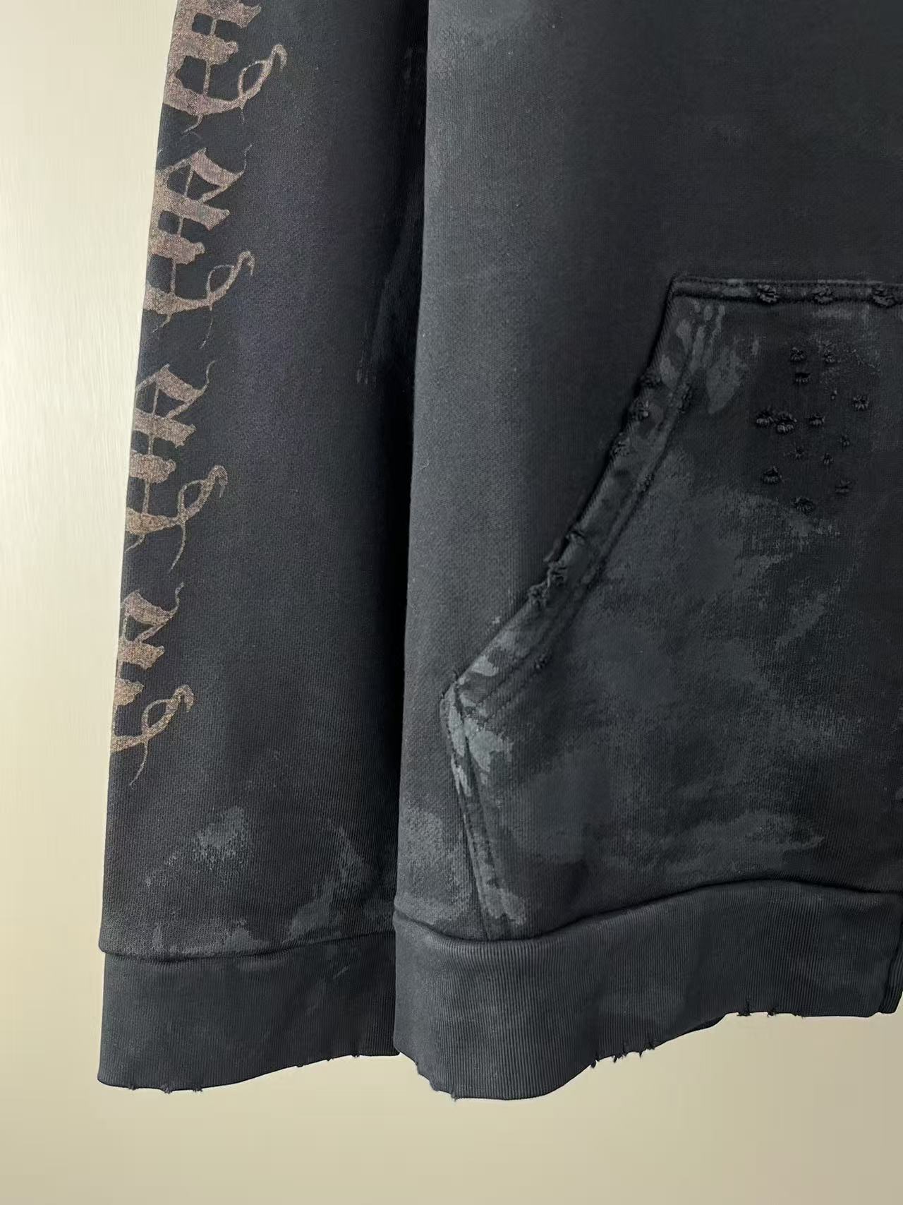 Balenciaga long-sleeve zip hoodie side view with front pocket and sleeve logo print